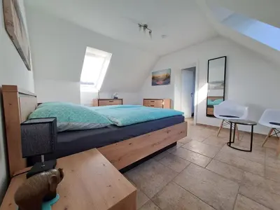 Ein Bett oder Betten in einem Zimmer der Unterkunft Ein Stück Glück