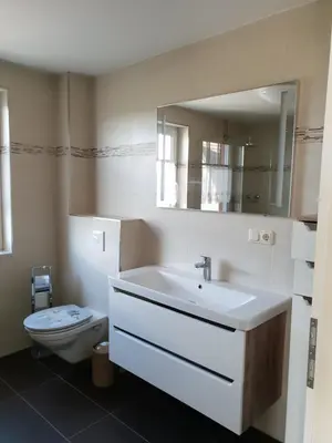 Ein Badezimmer in der Unterkunft Ferienhaus Segelboot Hirtenweg 3c