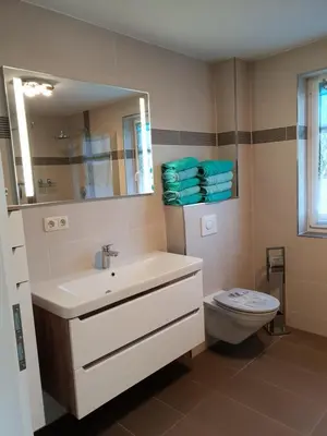 Ein Badezimmer in der Unterkunft Ferienhaus Segelboot Hirtenweg 3c