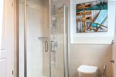 Ein Badezimmer in der Unterkunft Düne 7 Apartment 7A 06