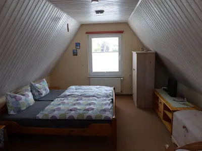 Ein Bett oder Betten in einem Zimmer der Unterkunft Ferienhaus Linke
