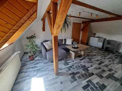 Ein Sitzbereich in der Unterkunft Ferienwohnung Feldblick