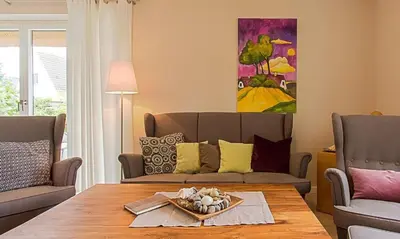 Ein Sitzbereich in der Unterkunft Schmugglerhus