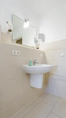 Ein Badezimmer in der Unterkunft Käpt'n Kalle Ferienwohnungen