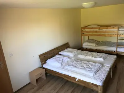 Ein Bett oder Betten in einem Zimmer der Unterkunft zum Sanddorn