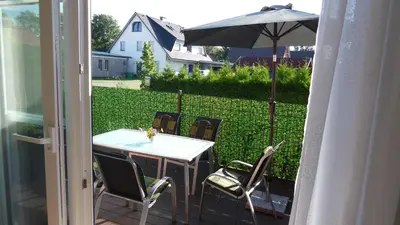 Ein Garten an der Unterkunft Ferienhaus-Windflüchter Hirtenweg 3B