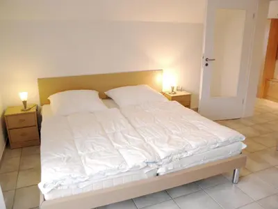 Ein Bett oder Betten in einem Zimmer der Unterkunft Glebbe 17 - Wohnung 8
