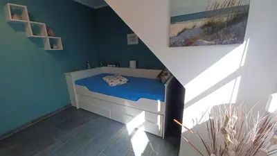 Ein Bett oder Betten in einem Zimmer der Unterkunft FW Leuchtturm