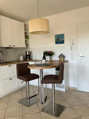 Küche/Küchenzeile in der Unterkunft Kleine Oase - Haus Meer Whg13