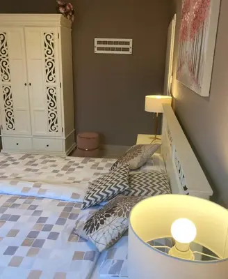 Ein Bett oder Betten in einem Zimmer der Unterkunft Villa Sienna