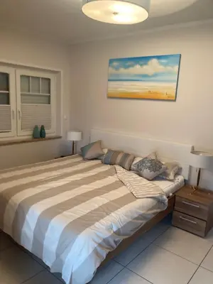 Ein Bett oder Betten in einem Zimmer der Unterkunft Villa Sienna