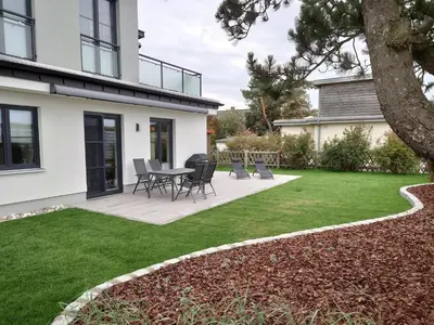 Ein Garten an der Unterkunft Kleine-Ostseeliebe