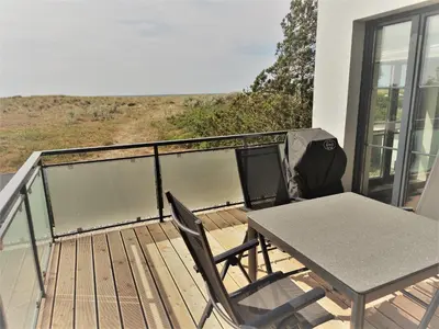 Ein Balkon oder eine Terrasse in der Unterkunft Kleine-Ostseeliebe 2