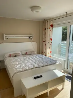 Ein Bett oder Betten in einem Zimmer der Unterkunft Apartment Strandglück