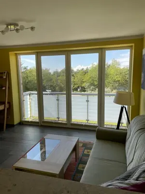 Ein Sitzbereich in der Unterkunft Apartment Strandglück
