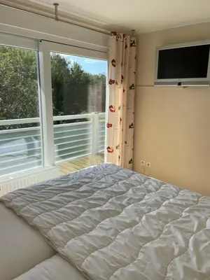 Ein Bett oder Betten in einem Zimmer der Unterkunft Apartment Strandglück