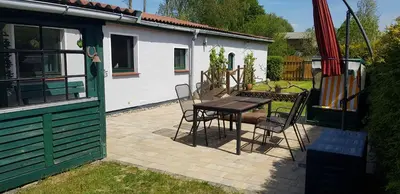 Ein Garten an der Unterkunft Ferienhaus Möwe