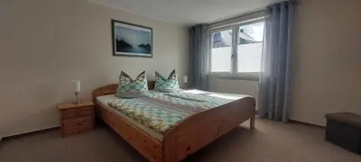 Ein Bett oder Betten in einem Zimmer der Unterkunft Rosi