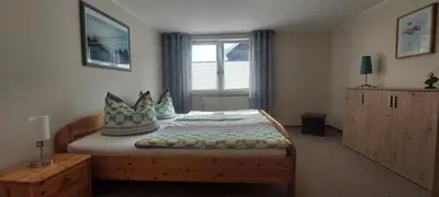 Ein Bett oder Betten in einem Zimmer der Unterkunft Rosi