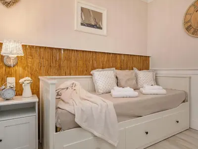 Ein Bett oder Betten in einem Zimmer der Unterkunft Ostseeklang