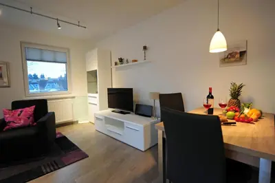 TV/Unterhaltungsangebot in der Unterkunft Zum Anker, moderne Ferienwohnung für 3 Personen in Zingst