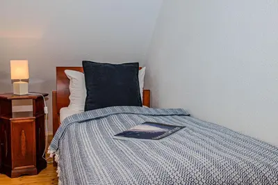 Ein Bett oder Betten in einem Zimmer der Unterkunft Glücksfinder
