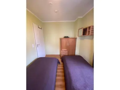 Ein Bett oder Betten in einem Zimmer der Unterkunft Villa Beatrice - Wohnung 17