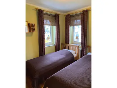 Ein Bett oder Betten in einem Zimmer der Unterkunft Villa Beatrice - Wohnung 17