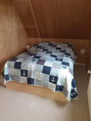 Ein Bett oder Betten in einem Zimmer der Unterkunft 2er Fewo-Zingst