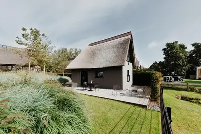 Ein Garten an der Unterkunft Refugium zum Hohen Ufer 