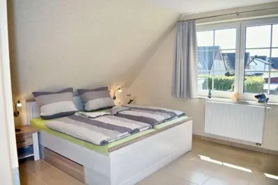 Ein Bett oder Betten in einem Zimmer der Unterkunft Ferienhaus Tunnisch