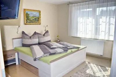 Ein Bett oder Betten in einem Zimmer der Unterkunft Ferienhaus Tunnisch