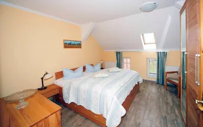 Ein Bett oder Betten in einem Zimmer der Unterkunft Hotel/Pension Bradhering