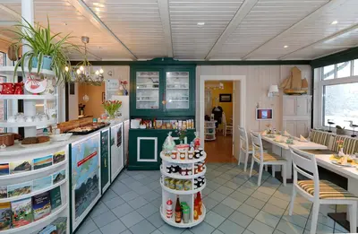 Ein Restaurant oder anderes Speiselokal in der Unterkunft Hotel/Pension Bradhering
