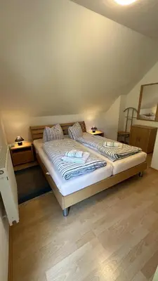 Ein Bett oder Betten in einem Zimmer der Unterkunft Haus Franzi Wohnung 1