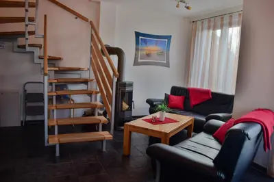 Ein Sitzbereich in der Unterkunft Ferienhaus am Bodden