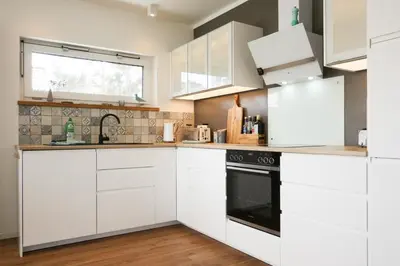Küche/Küchenzeile in der Unterkunft Ferienhaus Redensee