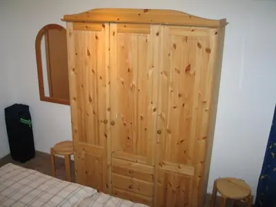 Ein Bett oder Betten in einem Zimmer der Unterkunft Sünnenkringel 57