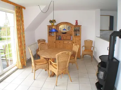 Ein Sitzbereich in der Unterkunft Ferienwohnung Sünnenkringel 58