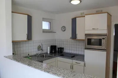 Küche/Küchenzeile in der Unterkunft Ferienwohnung Sünnenkringel 58