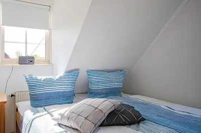 Ein Bett oder Betten in einem Zimmer der Unterkunft Wismar