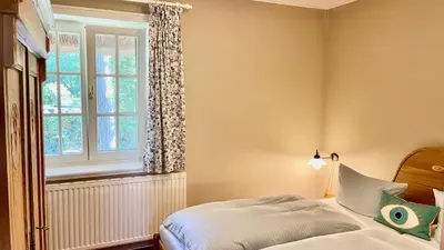 Ein Bett oder Betten in einem Zimmer der Unterkunft Haus Strandgut FW 1