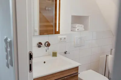 Ein Badezimmer in der Unterkunft SandKorn 1 und 2