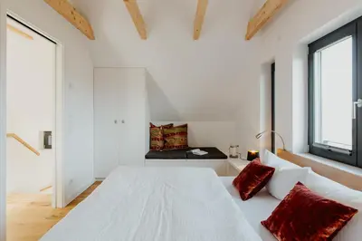 Ein Bett oder Betten in einem Zimmer der Unterkunft SandKorn 1 und 2