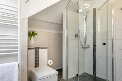 Ein Badezimmer in der Unterkunft Deichgraf Wohnung 07 