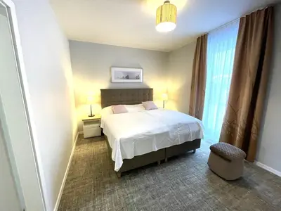 Ein Bett oder Betten in einem Zimmer der Unterkunft Ferienwohnung Baltic Lagoon Ostsee