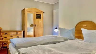 Ein Bett oder Betten in einem Zimmer der Unterkunft Haus Strandgut FW 3