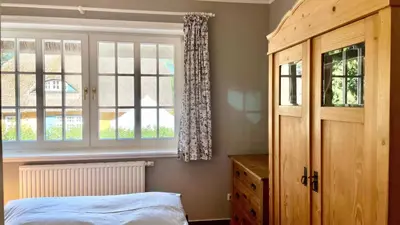 Ein Bett oder Betten in einem Zimmer der Unterkunft Haus Strandgut FW 3