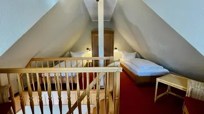 Ein Bett oder Betten in einem Zimmer der Unterkunft Haus Strandgut FW 4