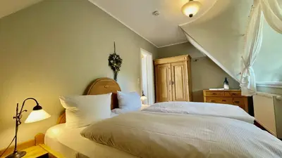 Ein Bett oder Betten in einem Zimmer der Unterkunft Haus Strandgut FW 4